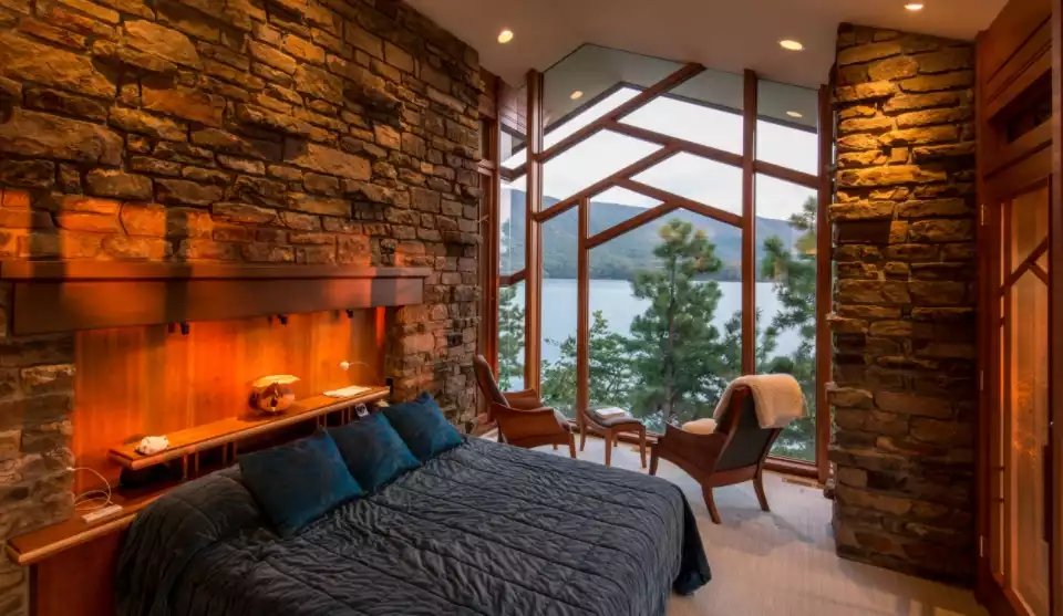 Rustic bedroom with stacked stone walls