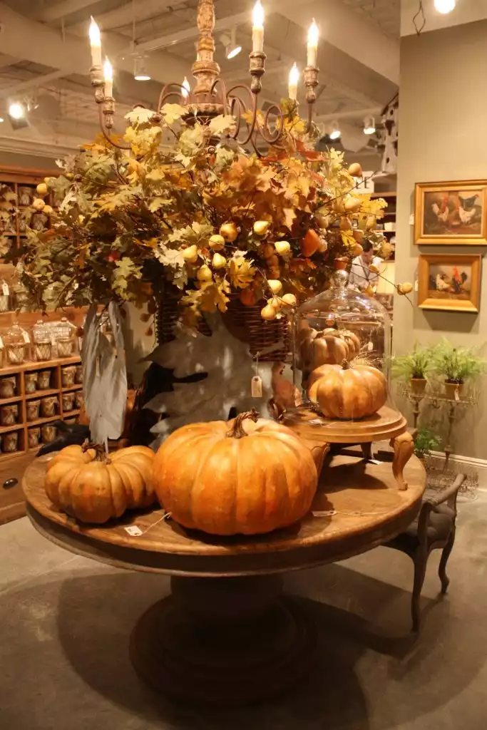 Rustic dining table with pumpkin decor 683x1024