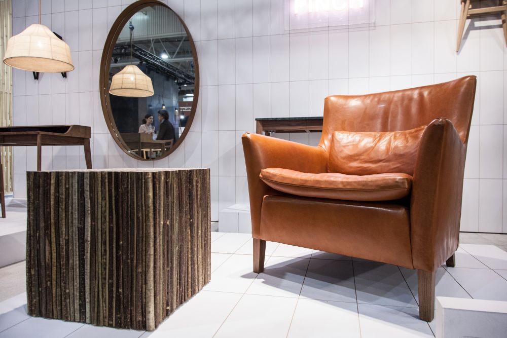 Rustic furniture and brown leather armchair