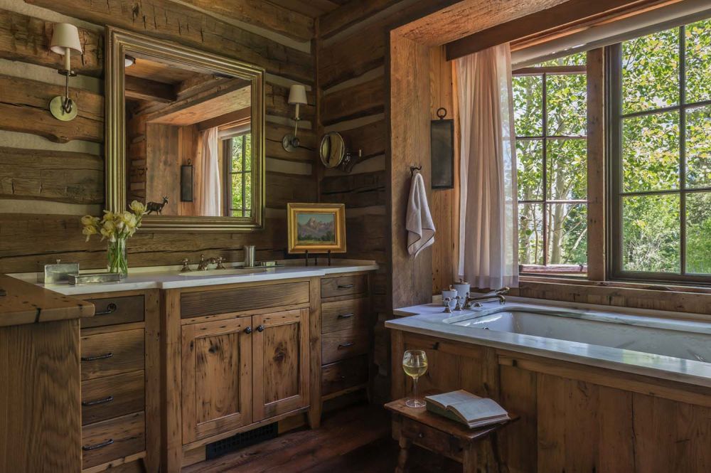 The rustic master bathroom is minimal in decor.