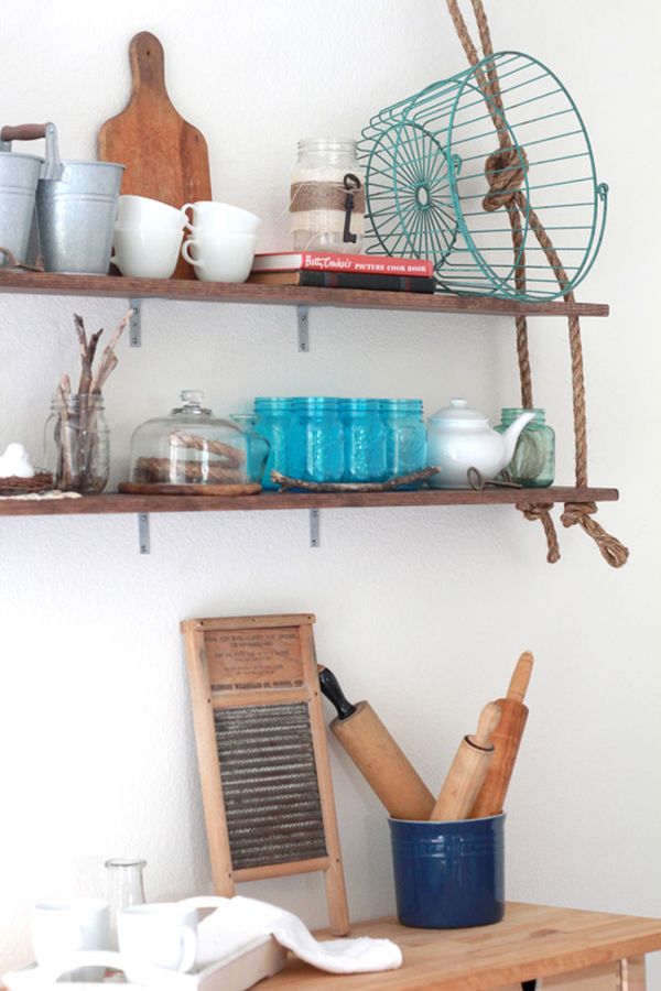 Rustic wood and rope shelves