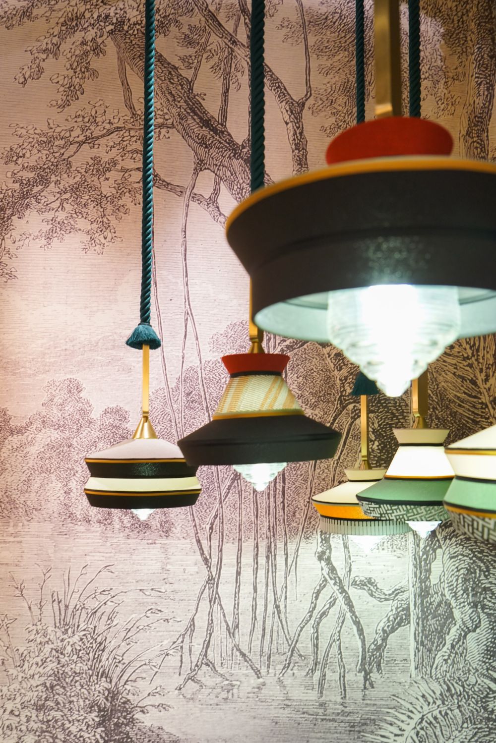 Satin brass diffused glass and silk make up these pieces 