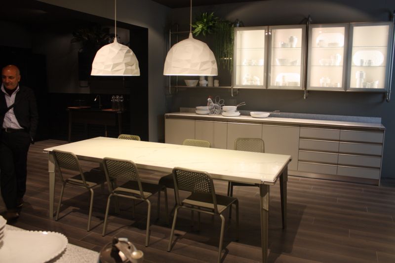 Kitchen pendant lights that look like they're made of crumpled paper are perfect over the table in this Scavolini kitchen.