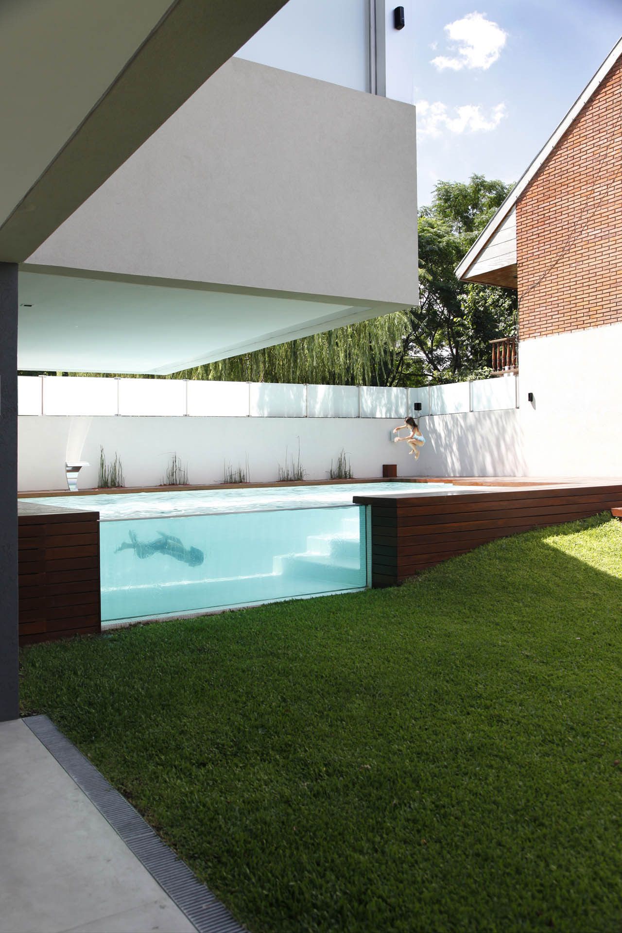 See Through Swimming pool Devoto House by Andres Remy Arquitectos