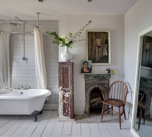 Shabby chic bathroom with Interesting Artwork