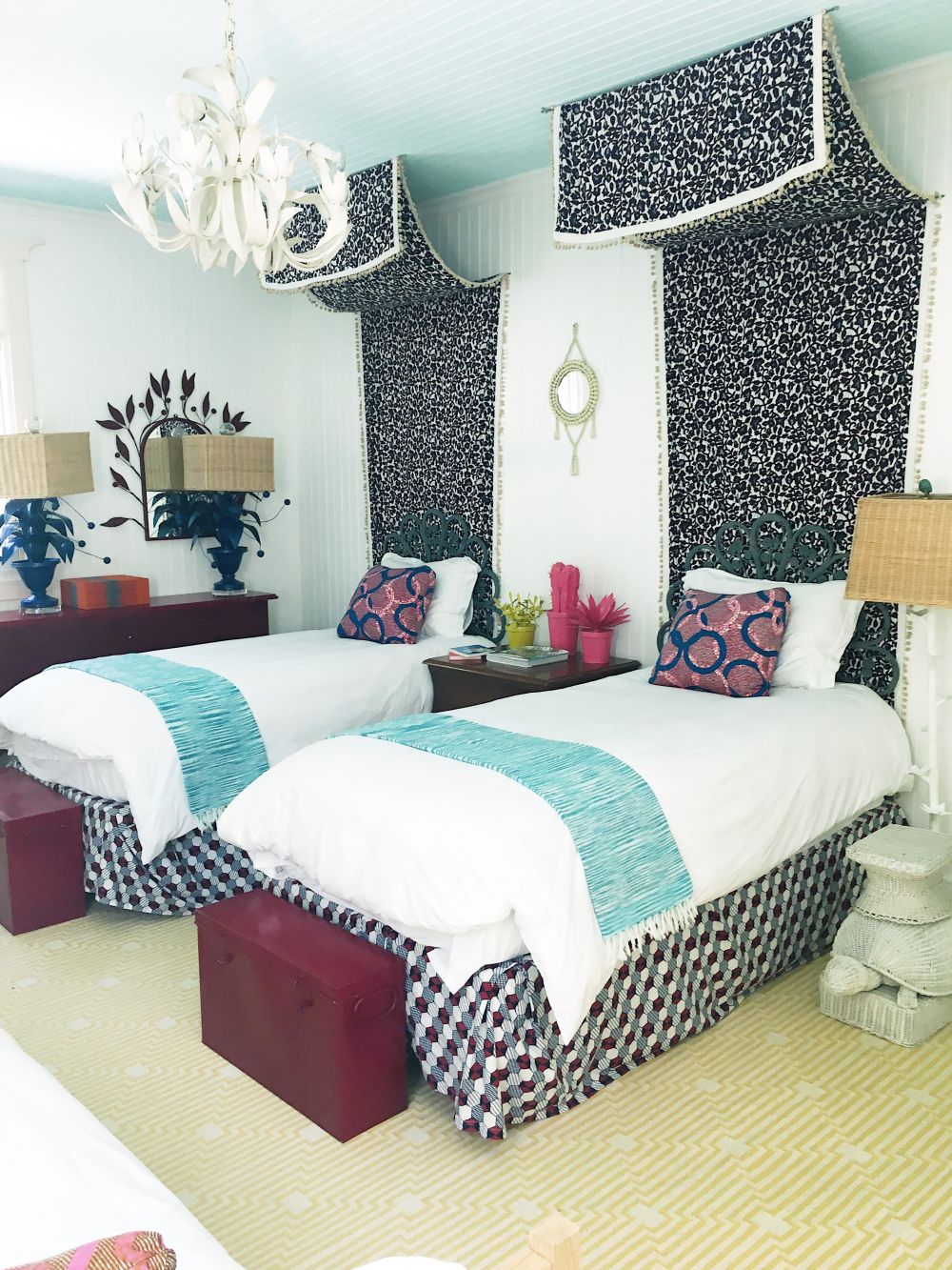 Shared bohemian bedroom with twin beds