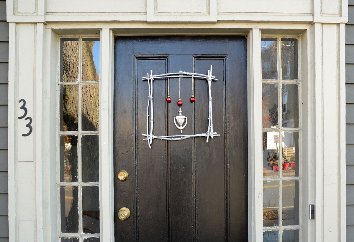 A square DIY Christmas wreath idea made of twigs