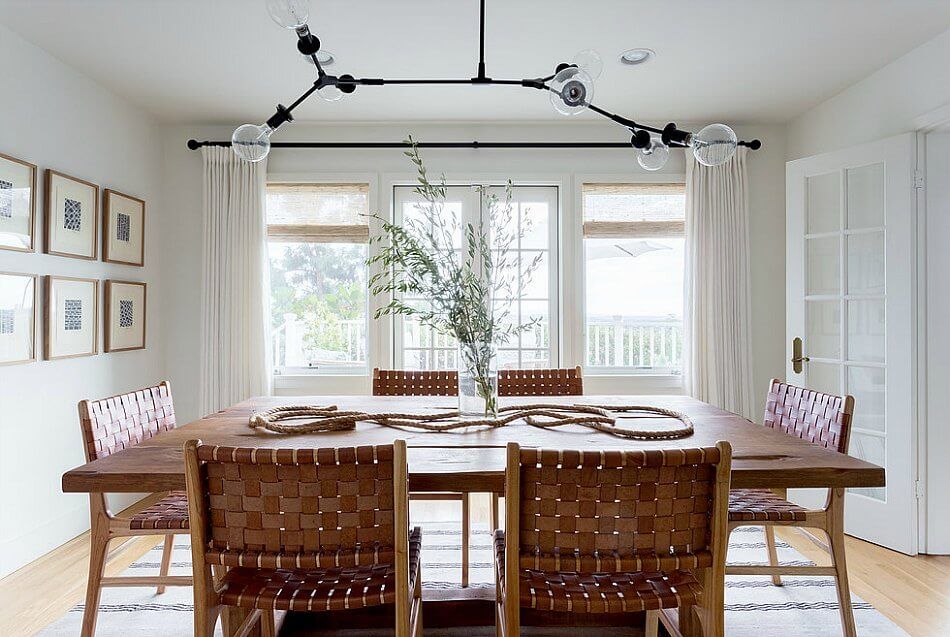 Simple dining table with black pendant lamp