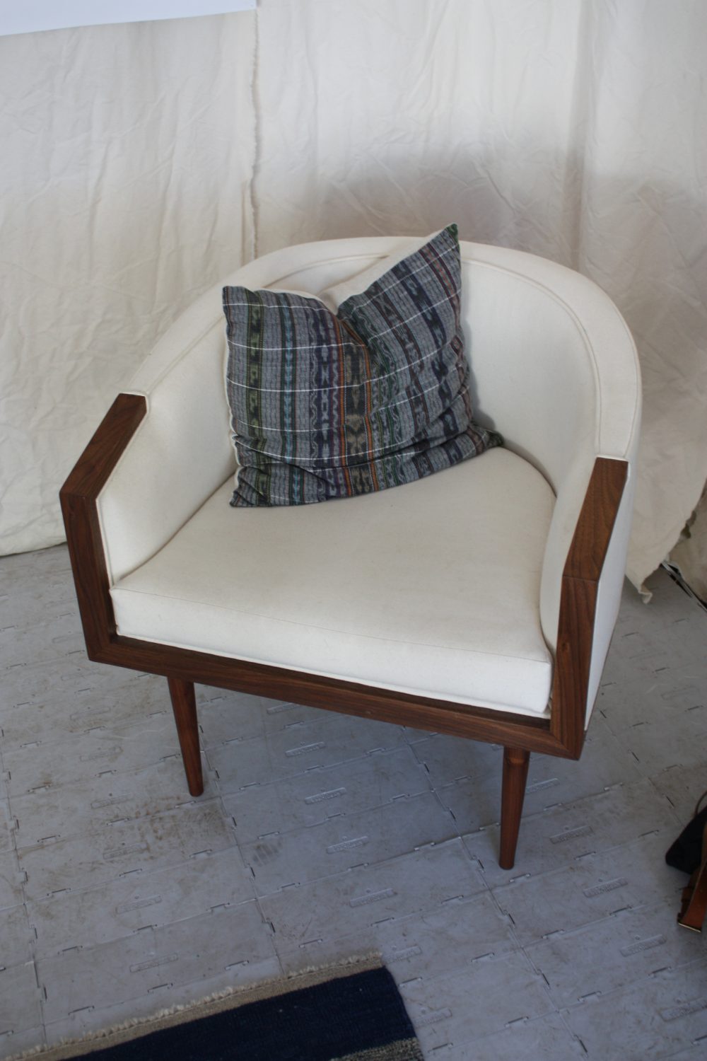 Simple walnut armchair