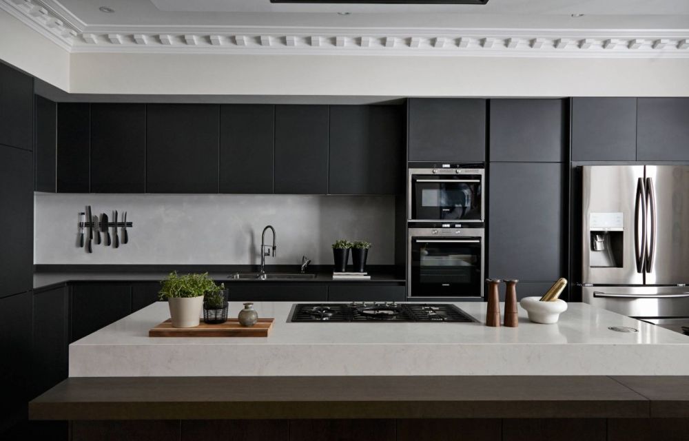 Sleek and organized black kitchen