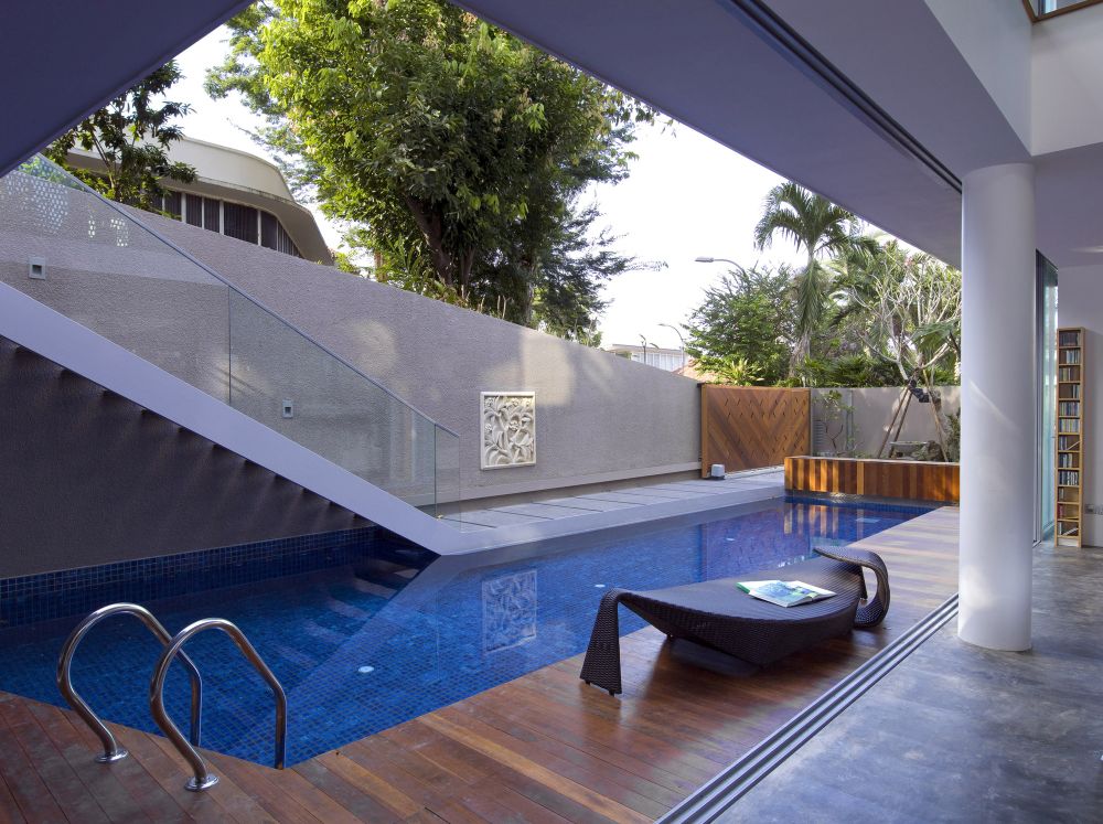 Sliding doors for pool and glass balustrade for staircase