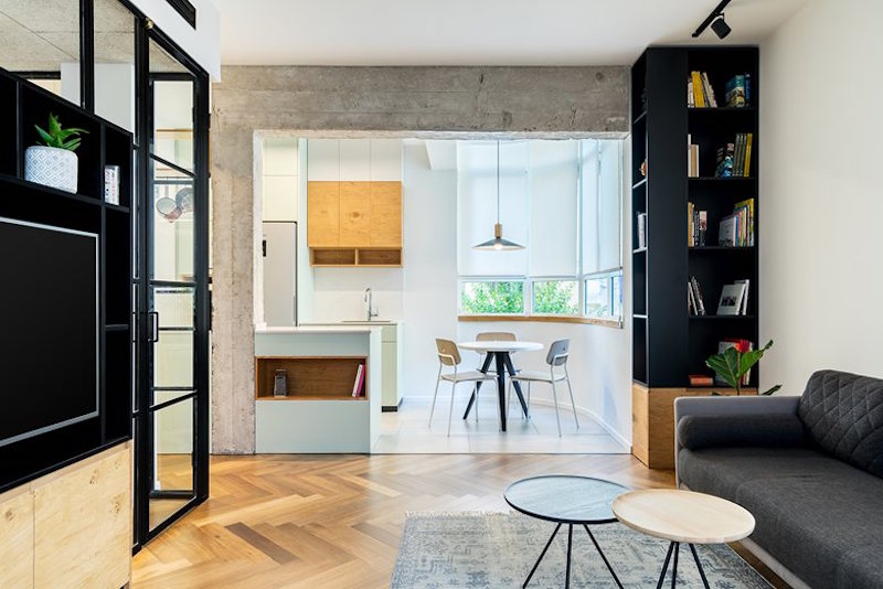 Small Apartment Merges Living And Working Spaces Into A Cozy Home