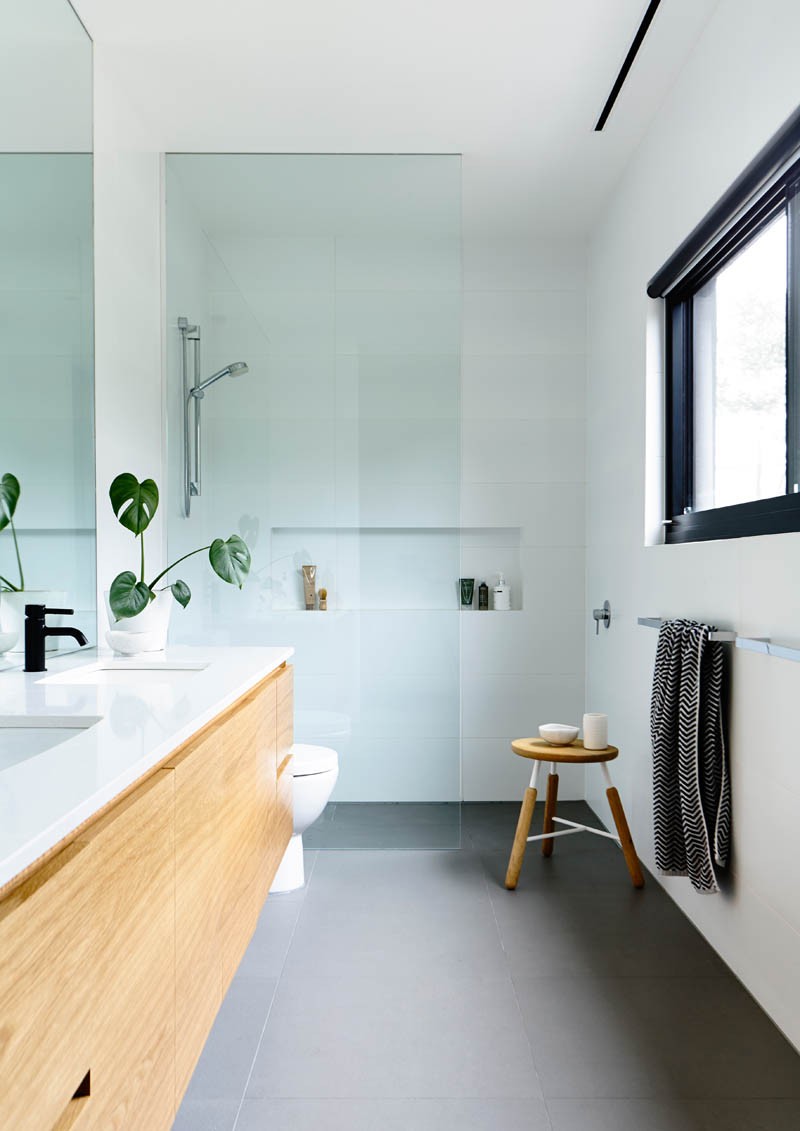 Cement bathroom vanity countertop design and black faucet