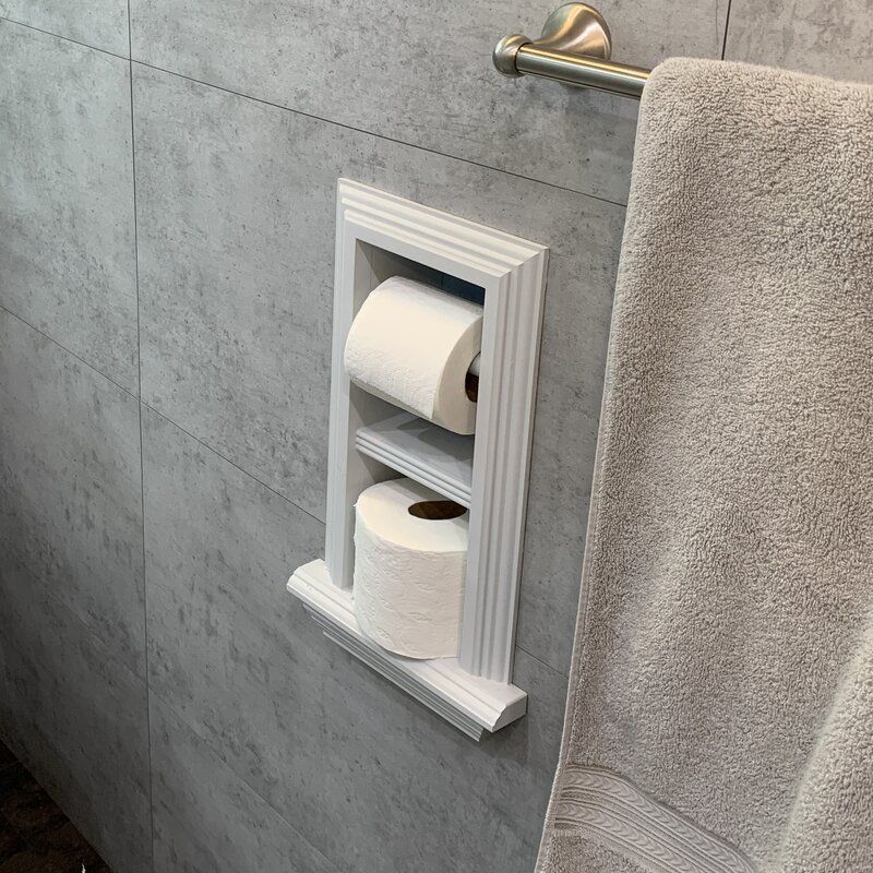 Small toilet paper holder with space for a spare