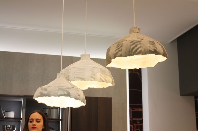 Rough, uneven and raw, these kitchen pendant lights in the Snaidero exhibit lend a natural feel to a modern space.
