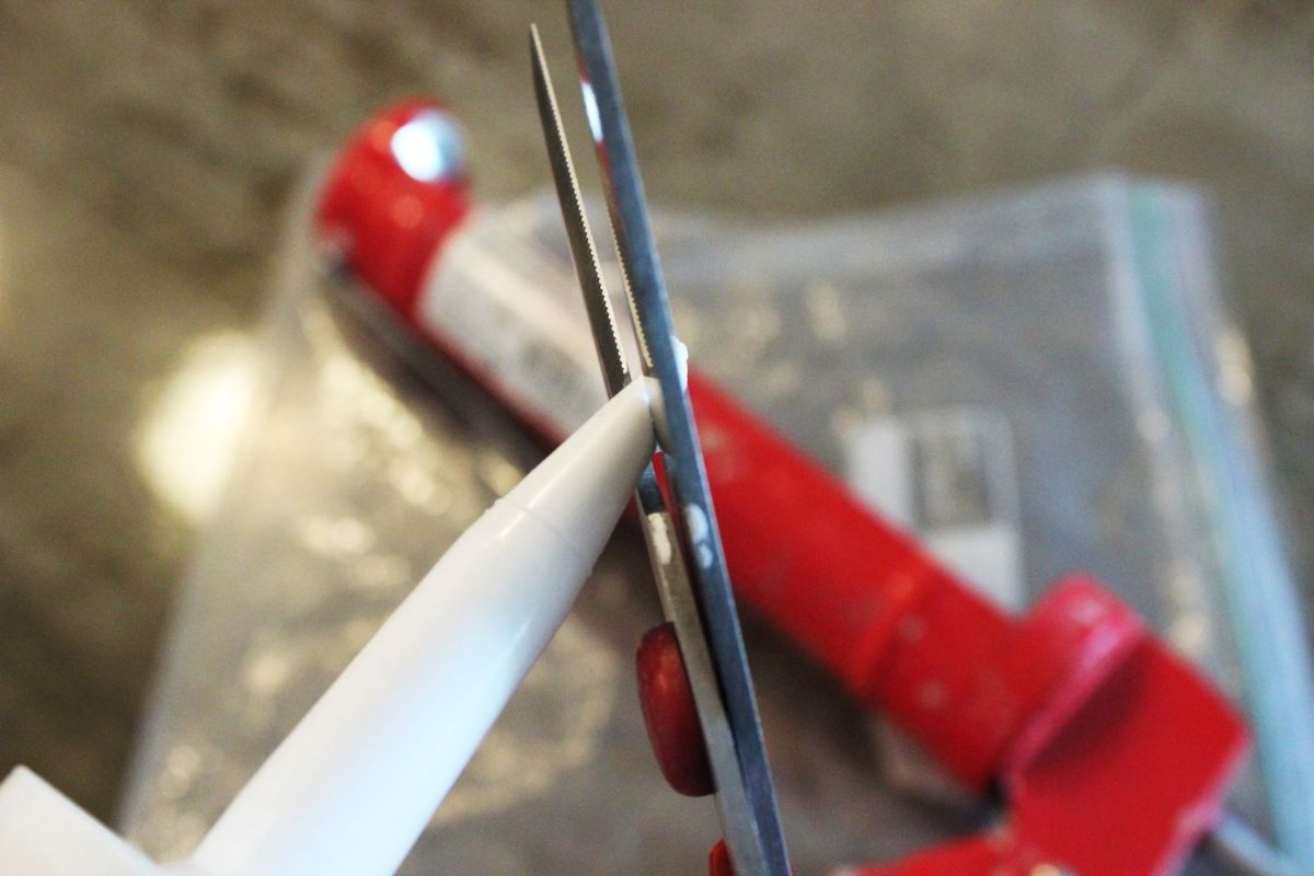 Snip the tip of your caulk bottle