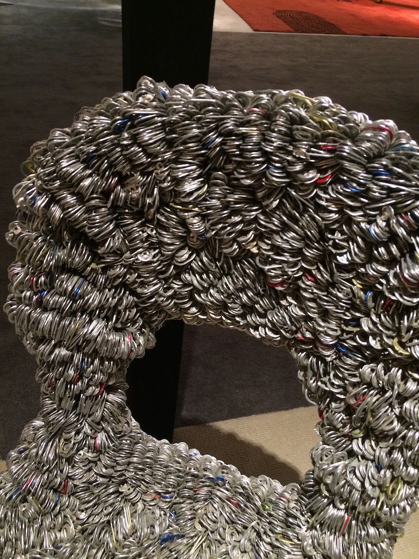 A closer view of the pop tabs that make up the chair.