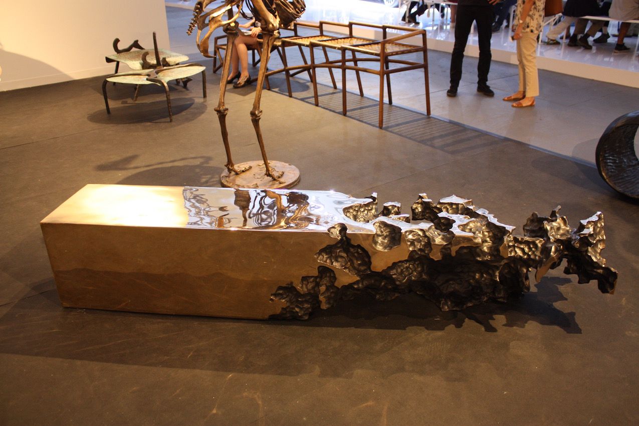 Also from the Southern Guild in Africa, this unique cast metal table is a conversation piece for sure.