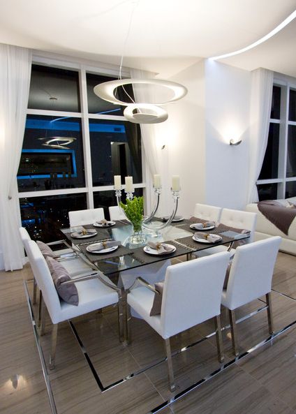 Square dining table with white chairs