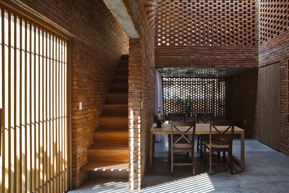 Stacked perforated bricks - Termitary House - natural light