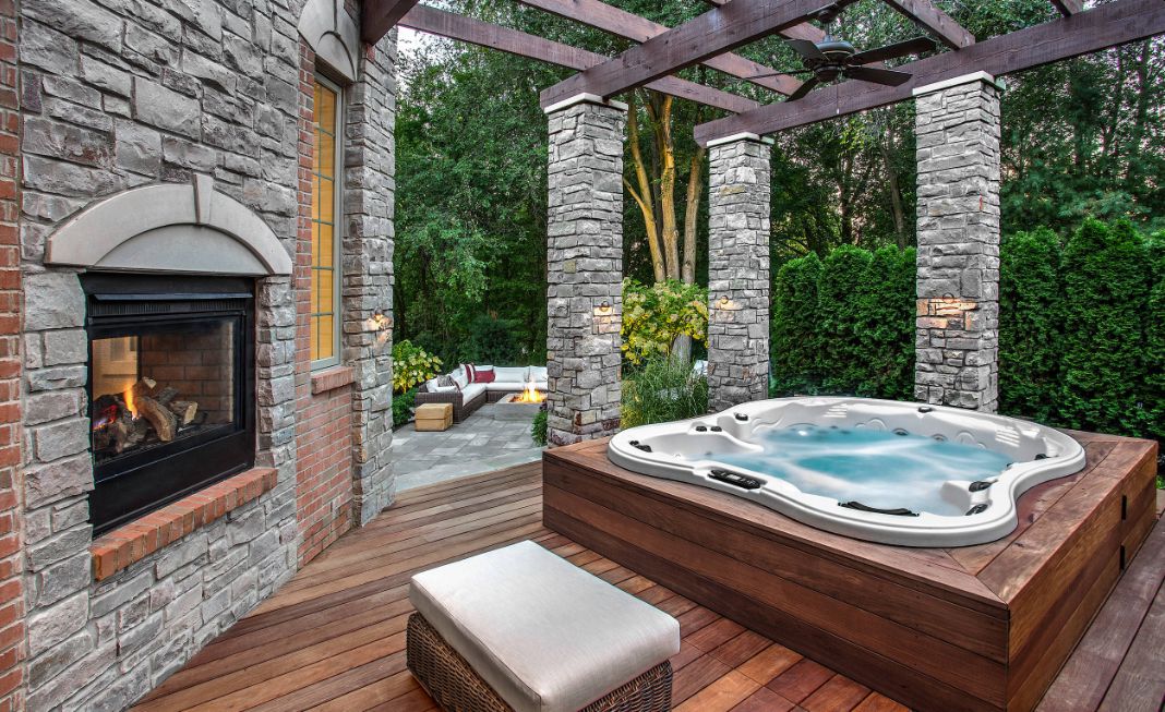 Stacked stone outdoor columns and deck hot tub