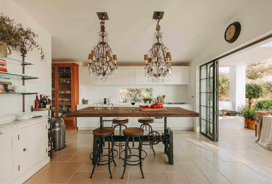 Standing rusting dining table and large chandelier