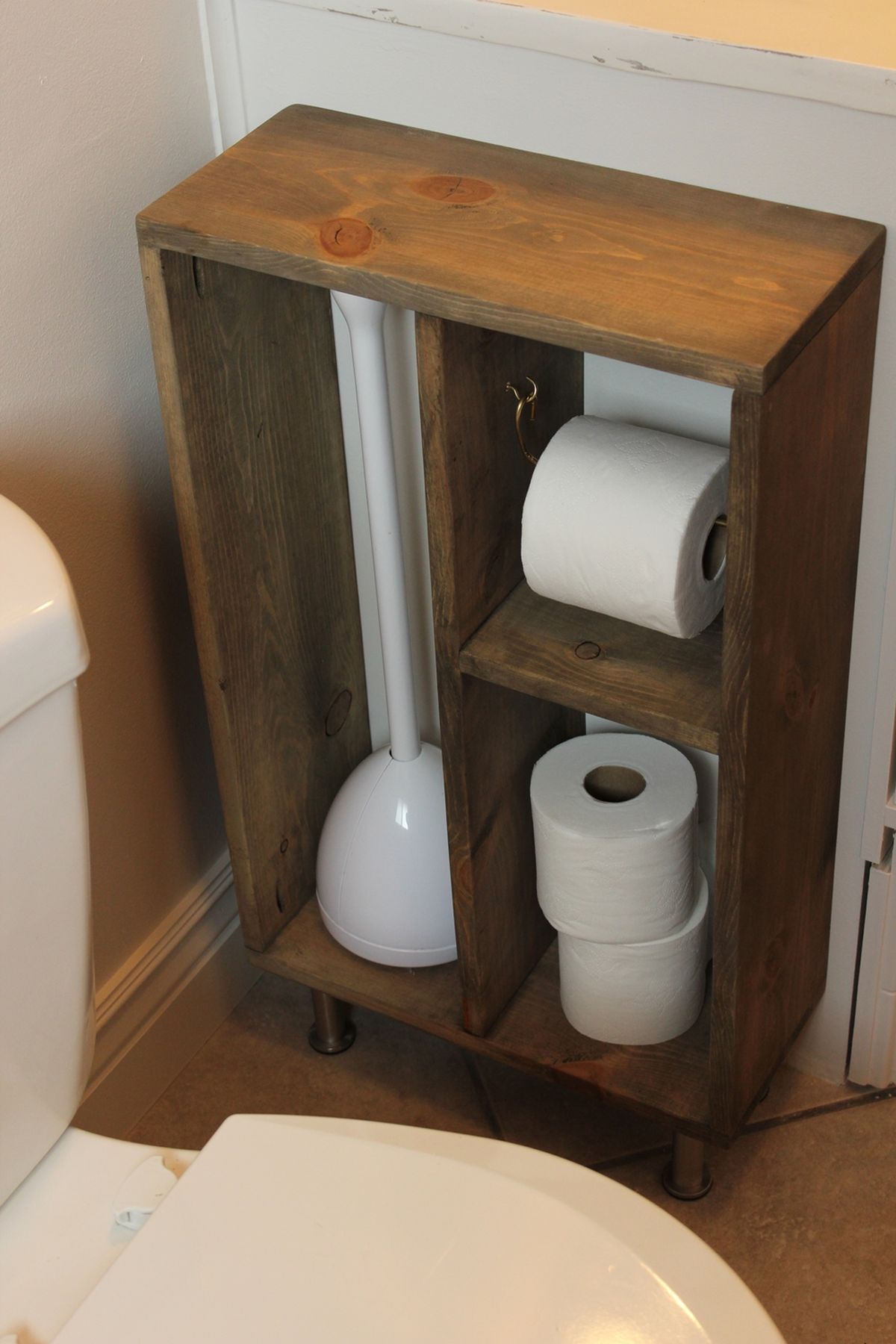 Standing wood storage for toilet paper