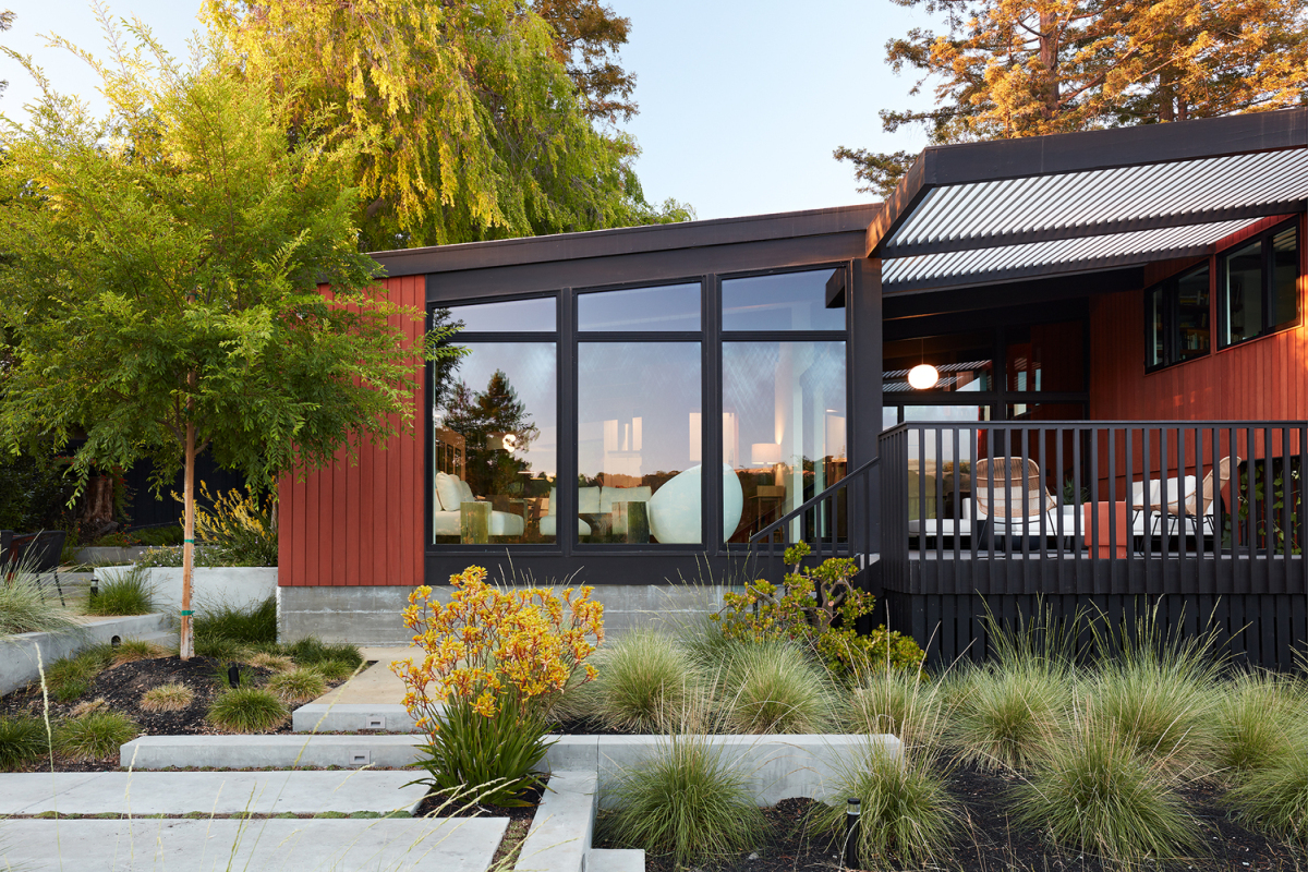 The new extension areas feature full-height windows and a strong connection with the outdoors