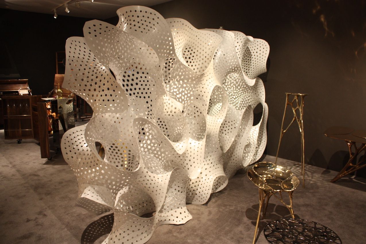 Star-shaped cut-outs perforate the large work.