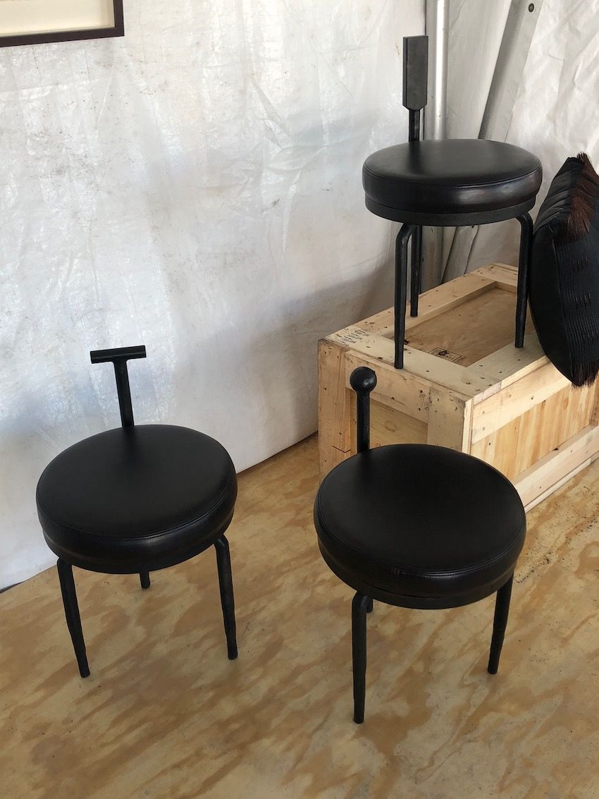 Useful stools with an edgy look are good additions for a modern space.