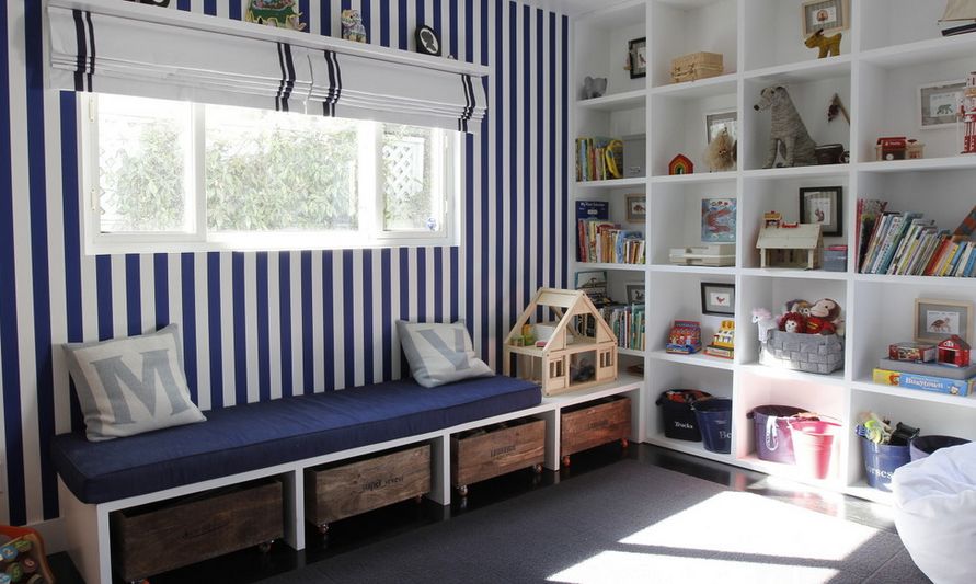 Striped walls and different storage system for playroom