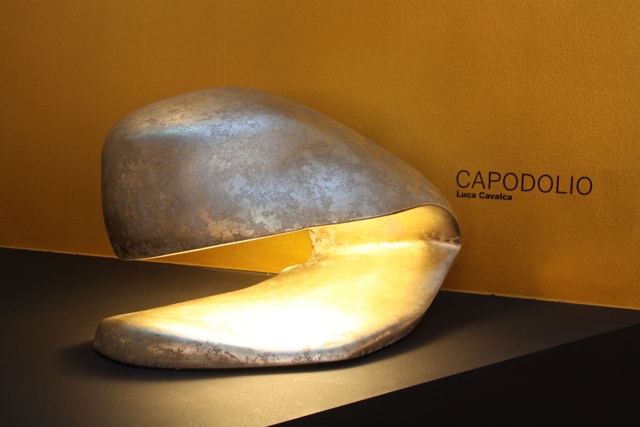 If your tastes run to silver, choose something more textural and matte, like this lamp from Stylenove Ceramiche.