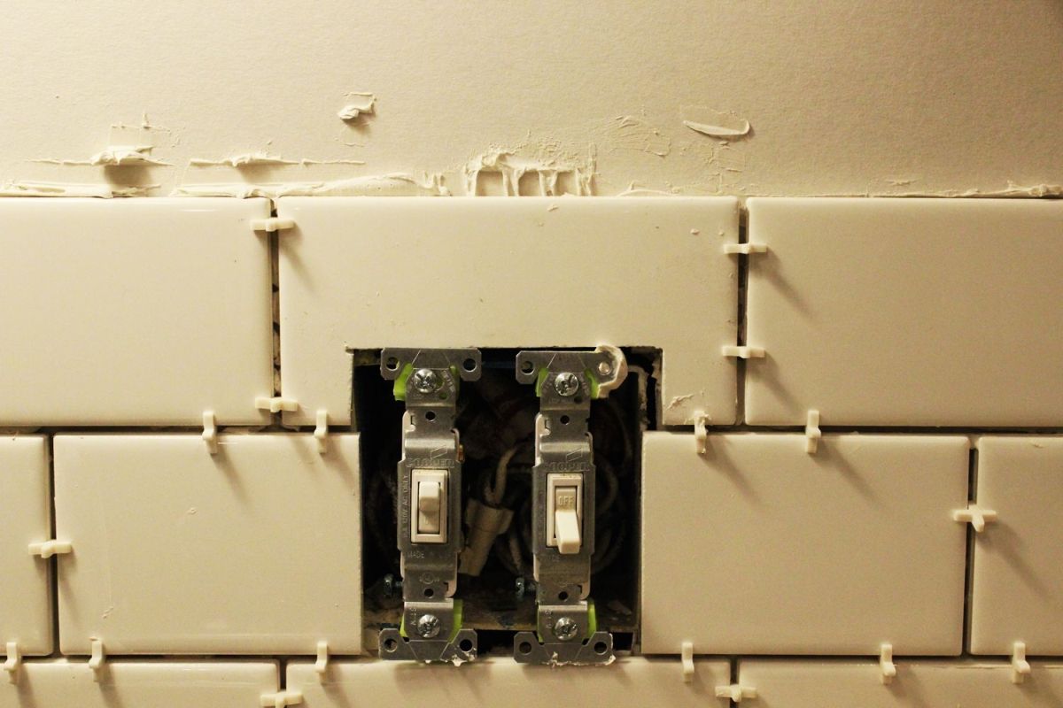 Subway tile fit Above double light switch box
