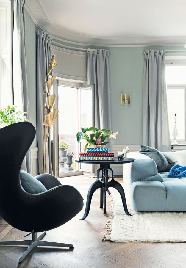 Swedish interior design with black leather egg chair