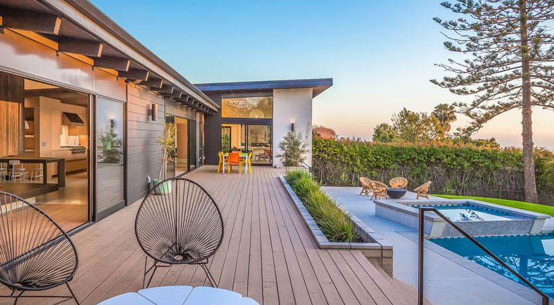 Swimming pool deck and backyard view