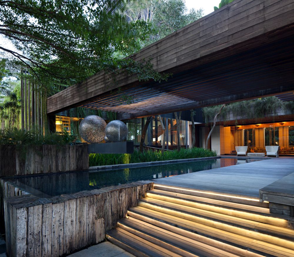 Swimming pool pergola and deck stairs- A Box in Disguise by Wahana Architects