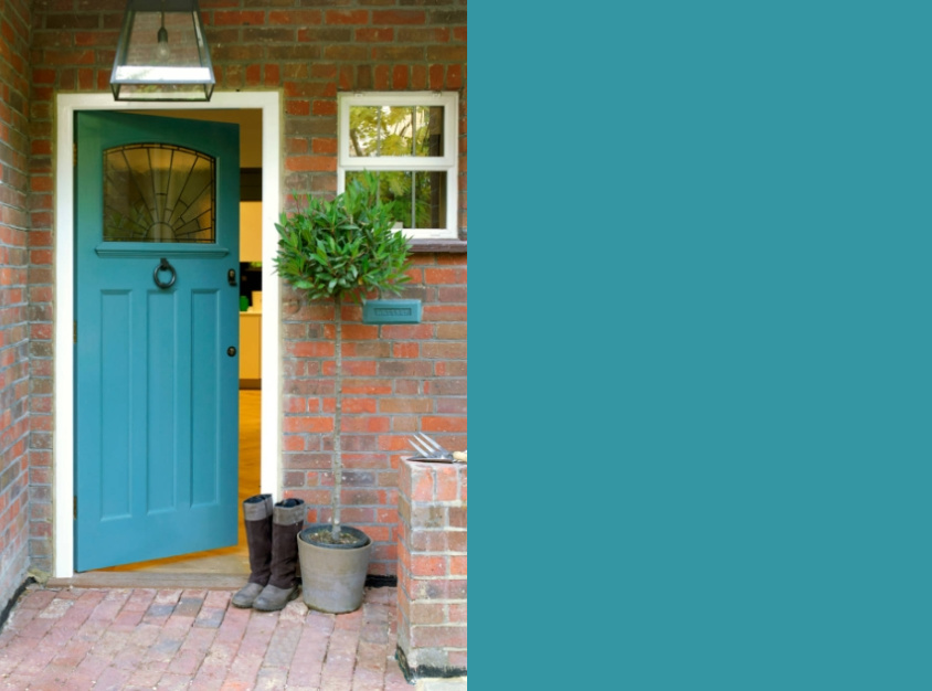 Teal Front Door with a Traditional Brick Home