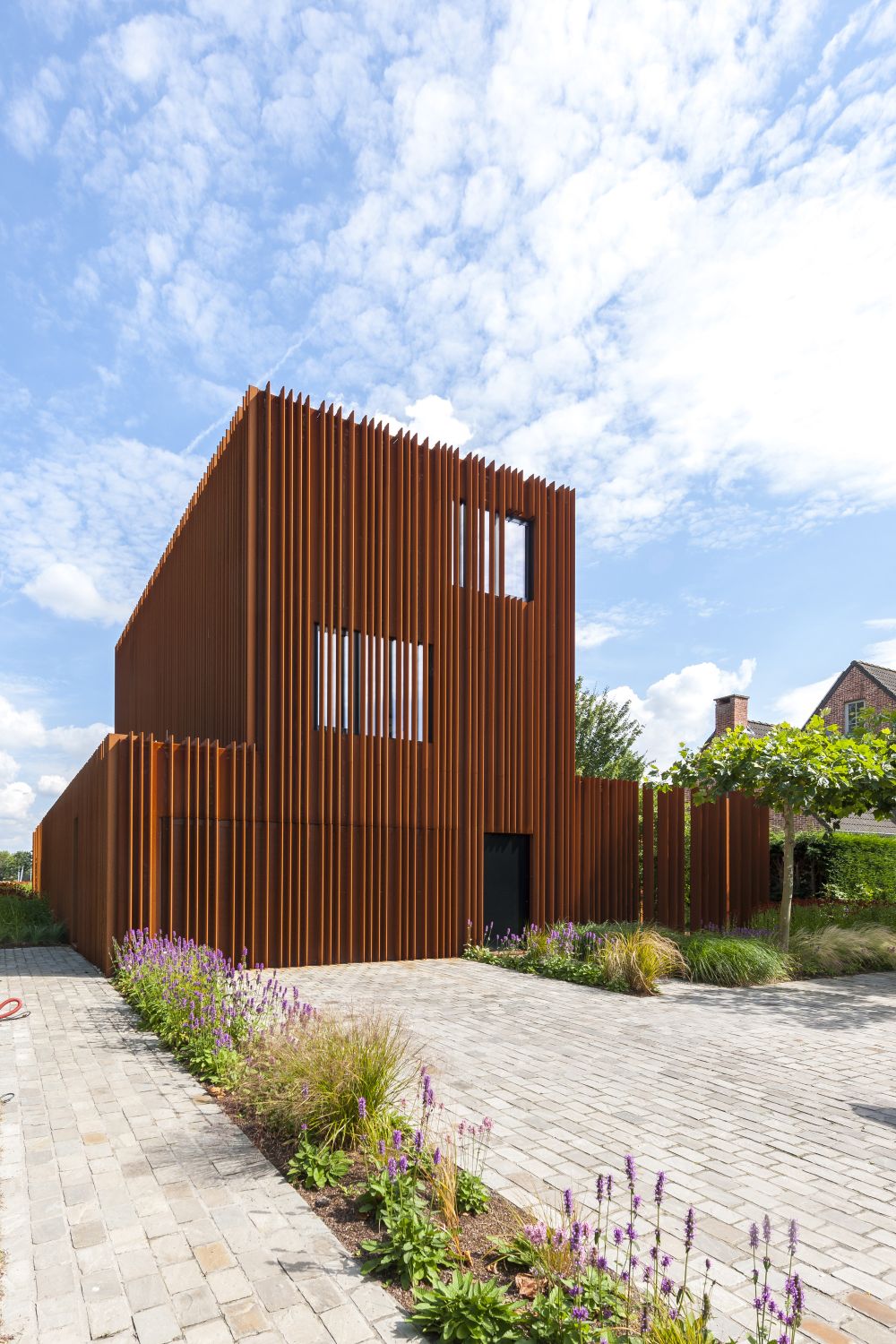 The Corten House by DMOA Architecten