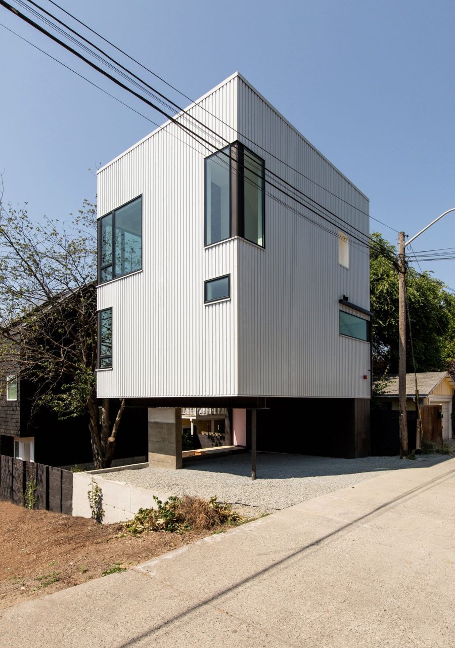 The Lookout by Hybrid raised on stilts over a Seattle alleyway side view