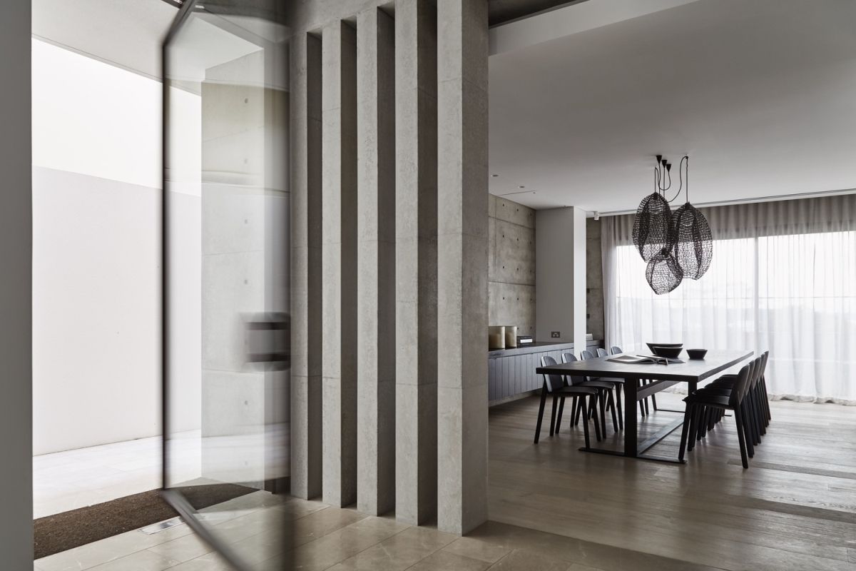 The concrete pillars go with the modern feel of the space.