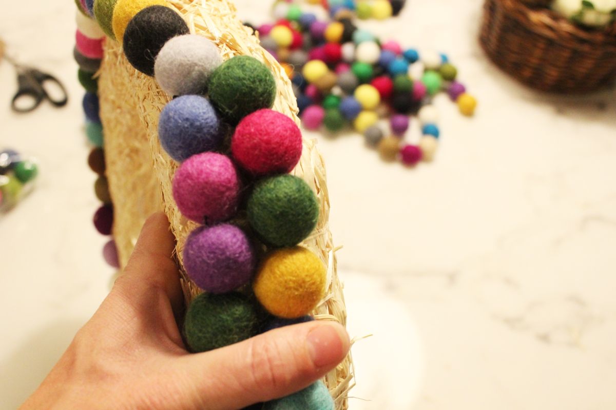 The second ring of felt balls