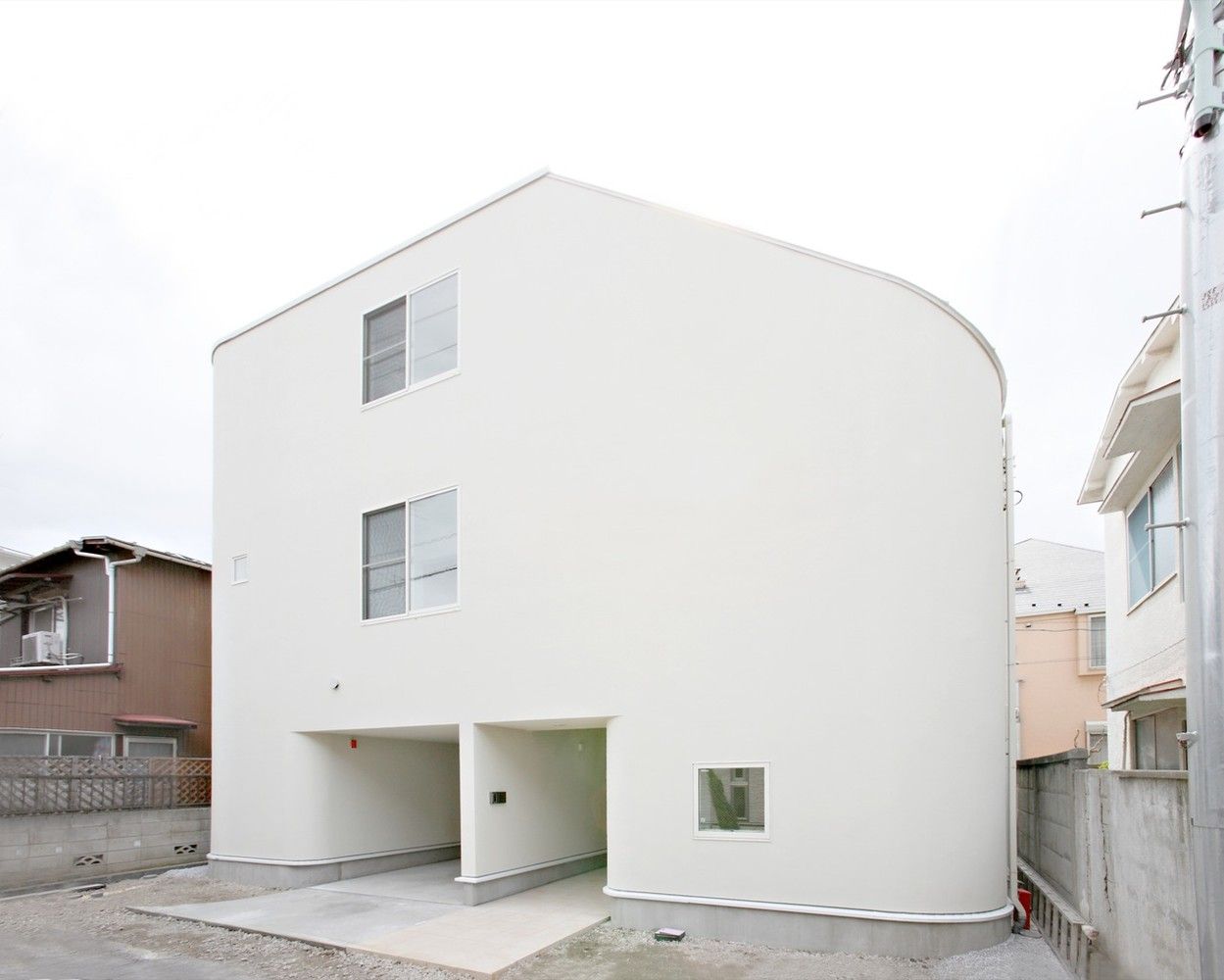 The slide house white facade