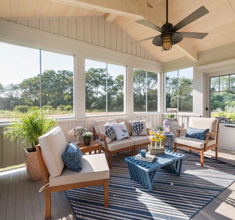 This old classic shingle-style home - sunroom decor