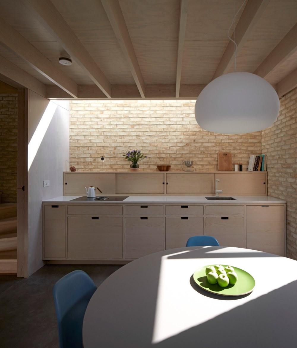 Tikari Works has built a half subterranean home kitchen