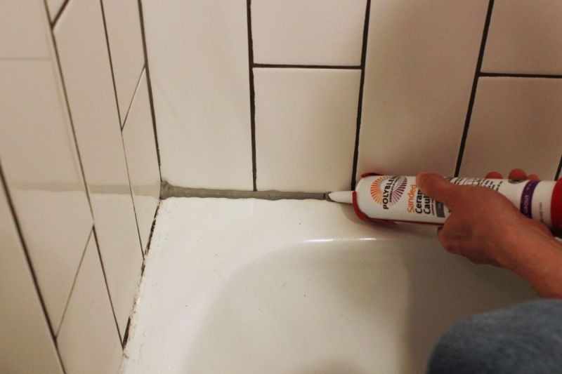 Tile caulk shower tub