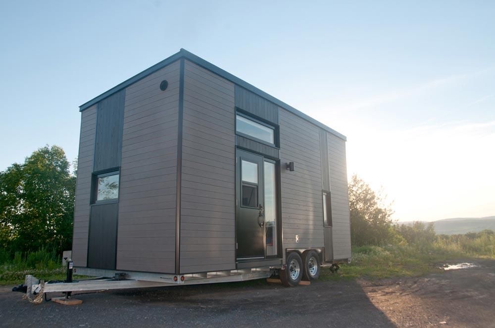 Tiny house on wheels with black exterior