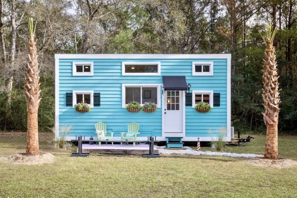 Tiny house with turquoise exterior