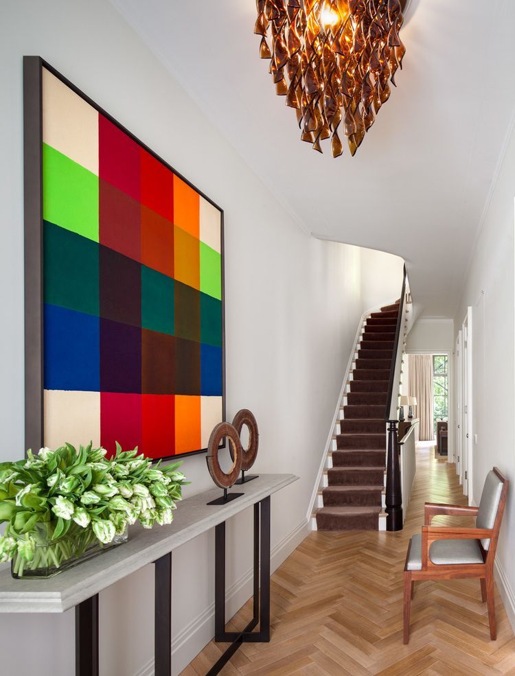 Townhouse Foyer With Framed Colorful Wall Art