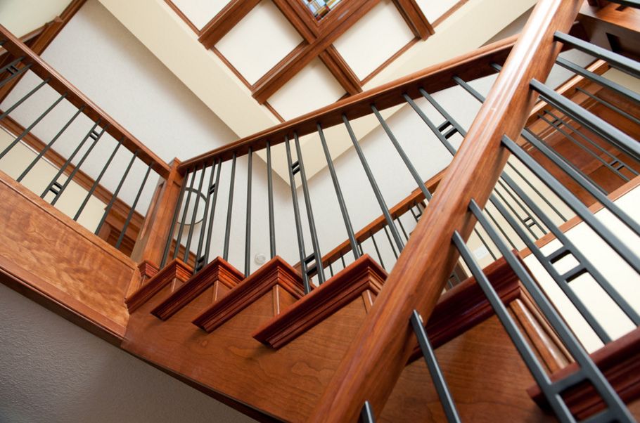 Traditional Closed Riser Stair with Clean, Contemporary Railing Lines.