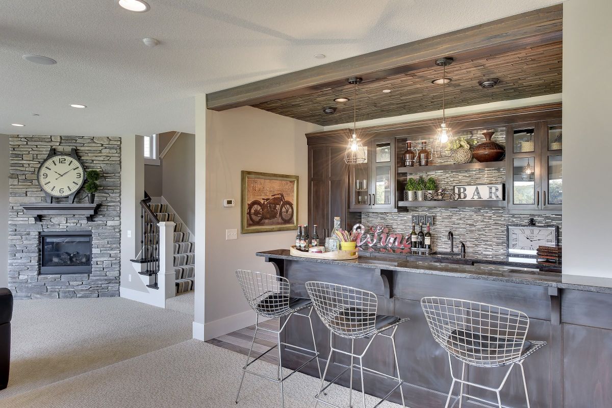 Traditional basement bar kitchen cabinetry